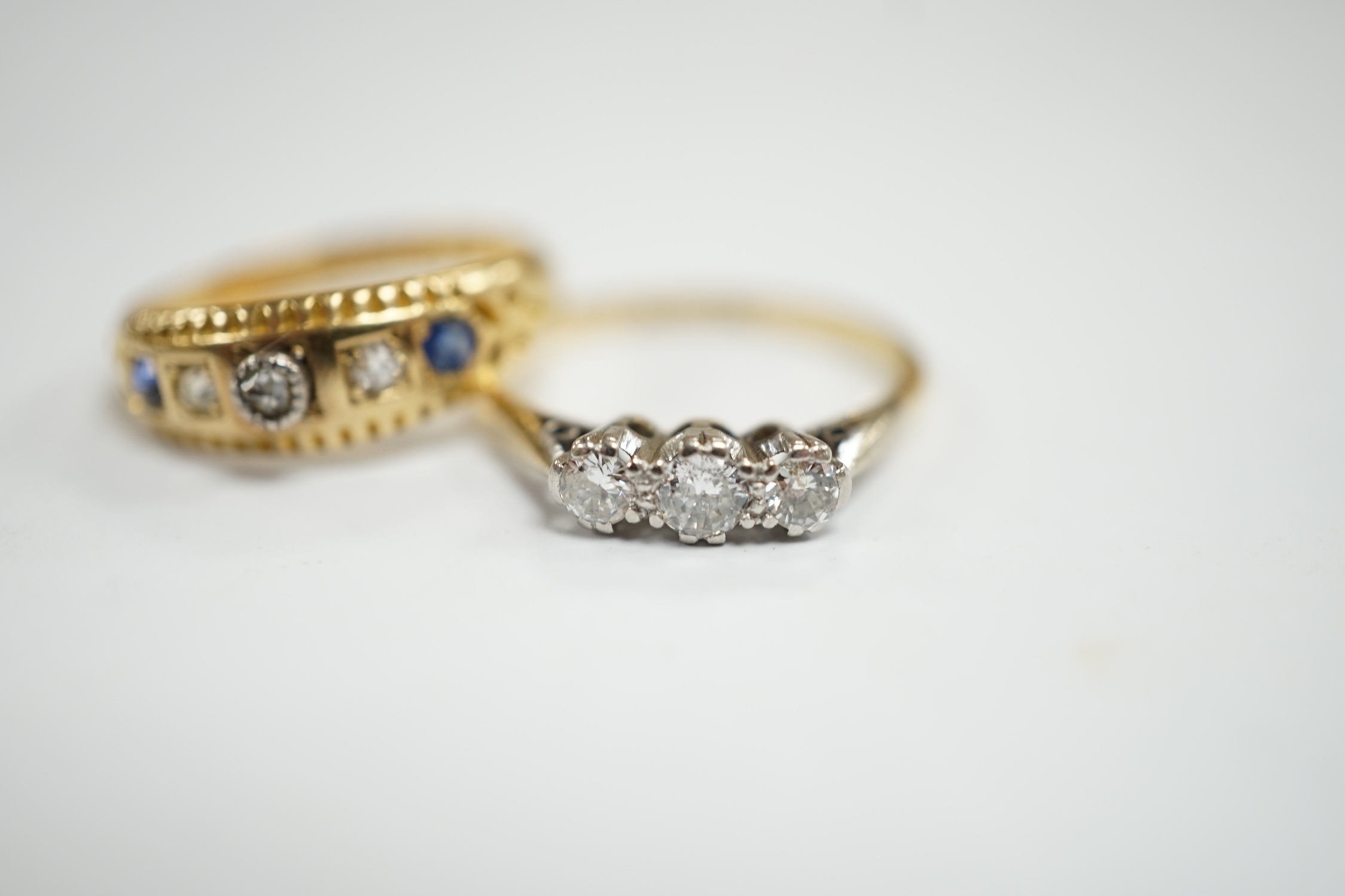 An 18ct, plat and three stone diamond set ring, size K and a late Victorian 18ct gold three stone - Image 2 of 4