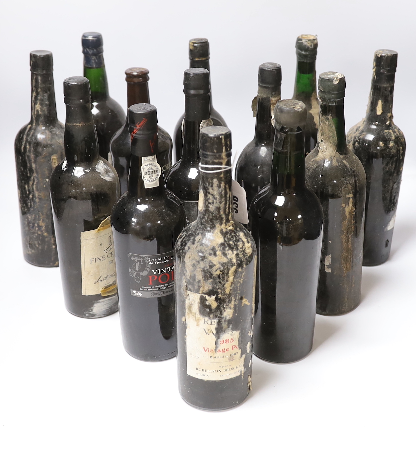 Thirteen various bottles of port, including a bottle of Dow’s 1975 vintage port
