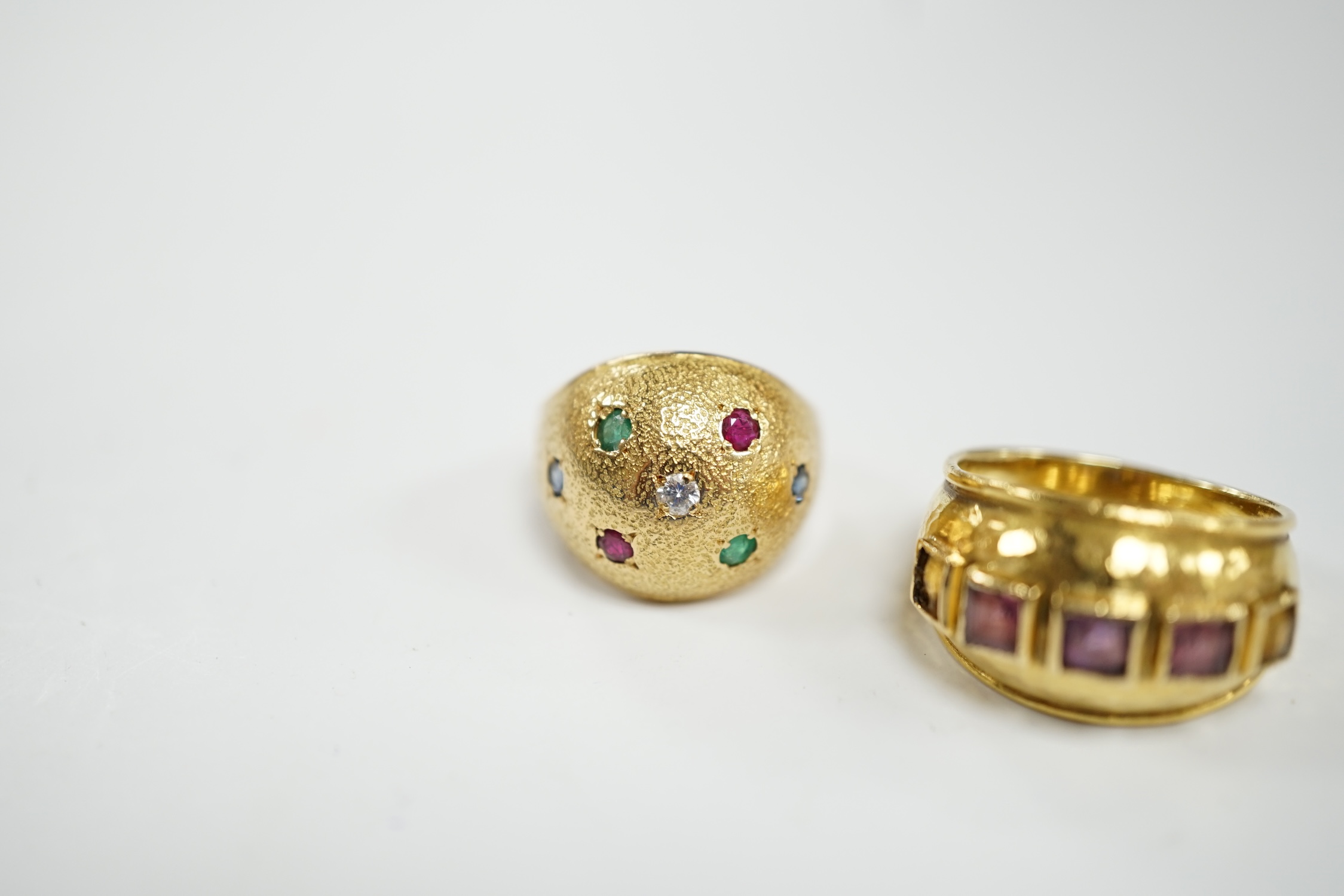 A textured yellow metal, emerald, ruby and diamond set domed ring, size K, together with a stylish - Image 4 of 6