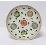 A Chinese famille verte ‘lotus flower’ dish, Kangxi period, 23cm diameter