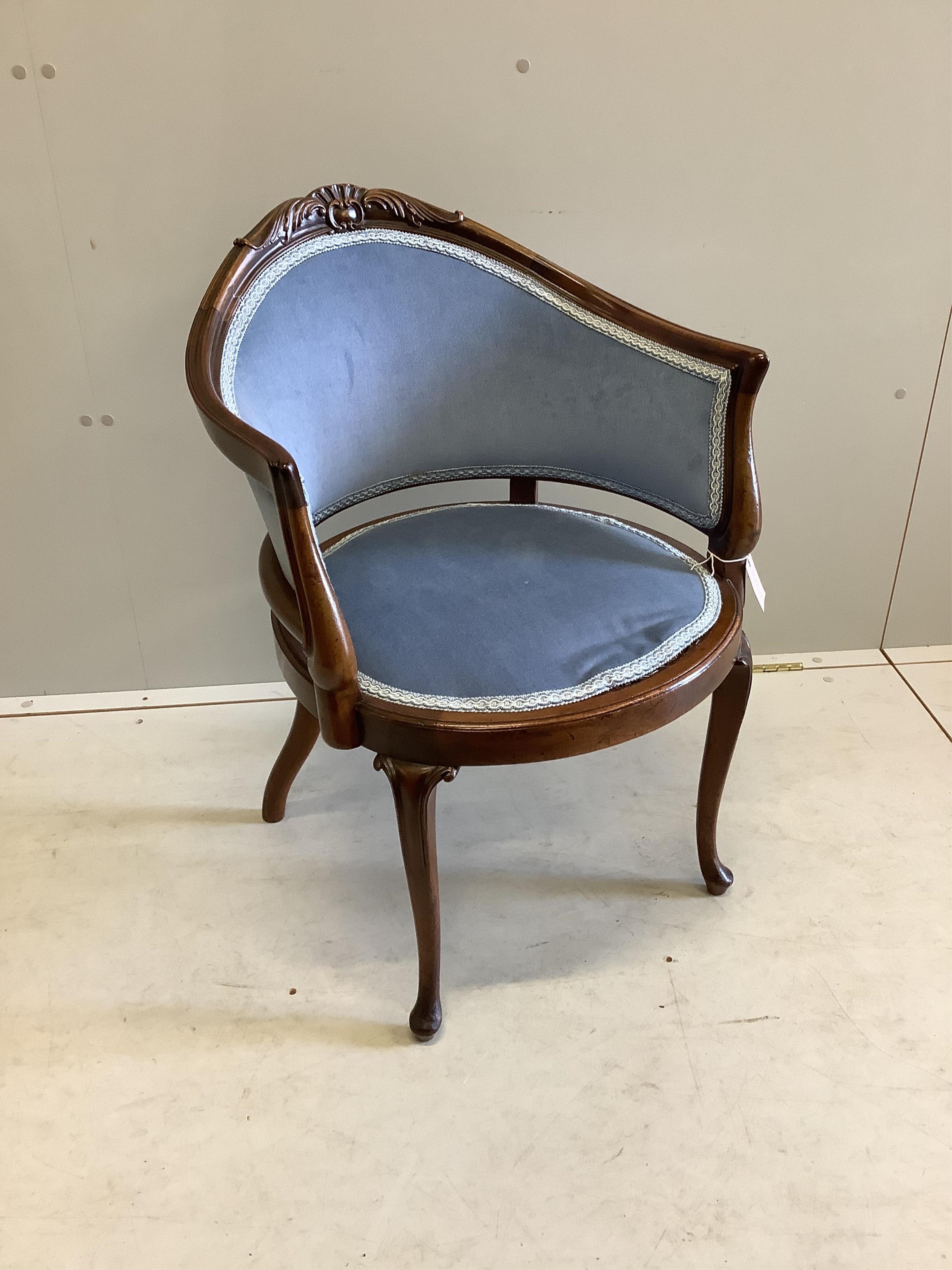 A carved and moulded mahogany show-wood frame tub chair, on cabriole legs, width 56cm, depth 52cm,