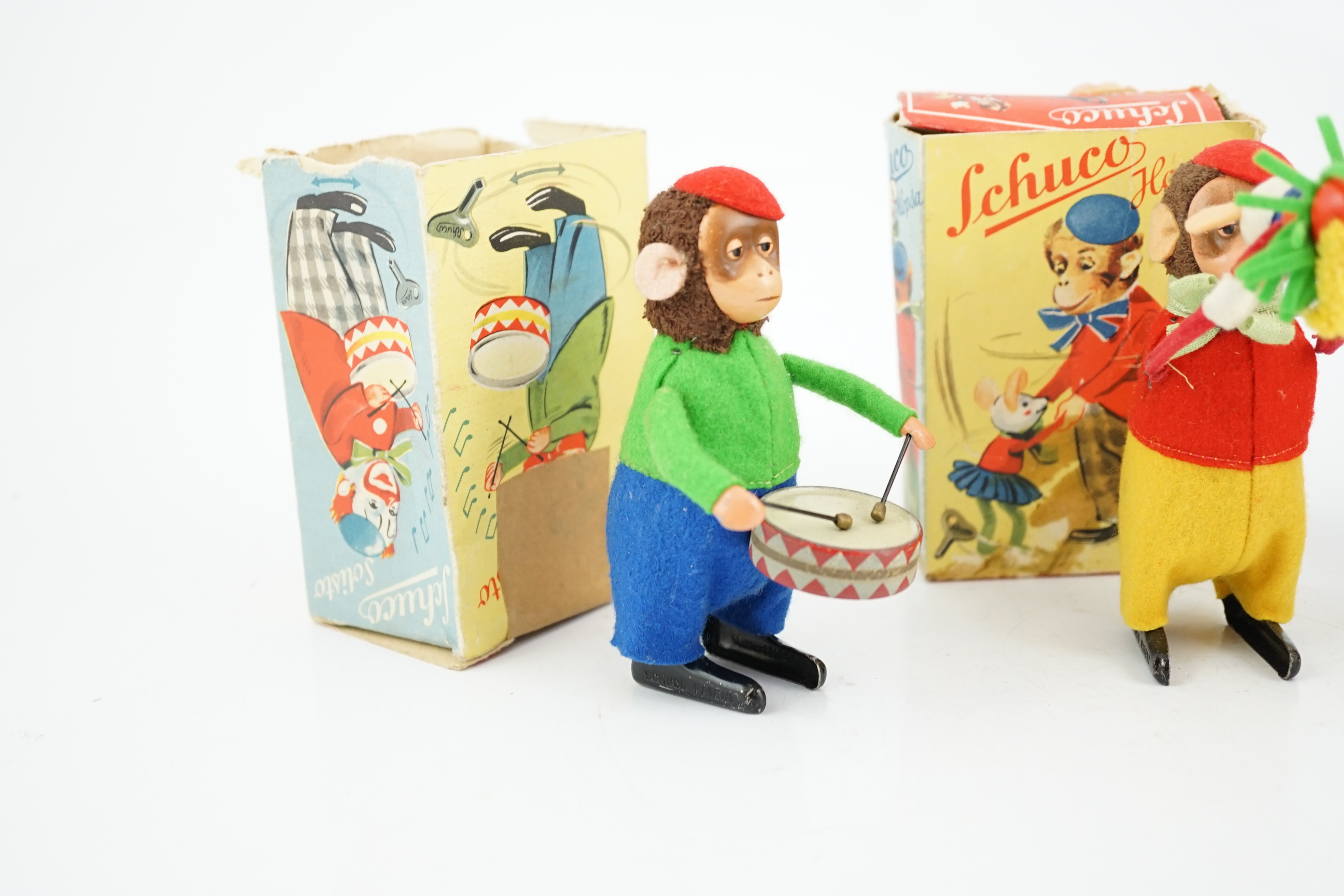 Three Schuco tinplate and felt clockwork monkeys; Hopsa, Solisto and Sousto, all contained within - Image 2 of 8