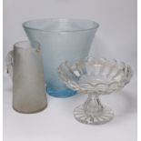A large heavy cut glass tazza with shaped rim, a tall blue tinted textured vase, height 31.5cm and a