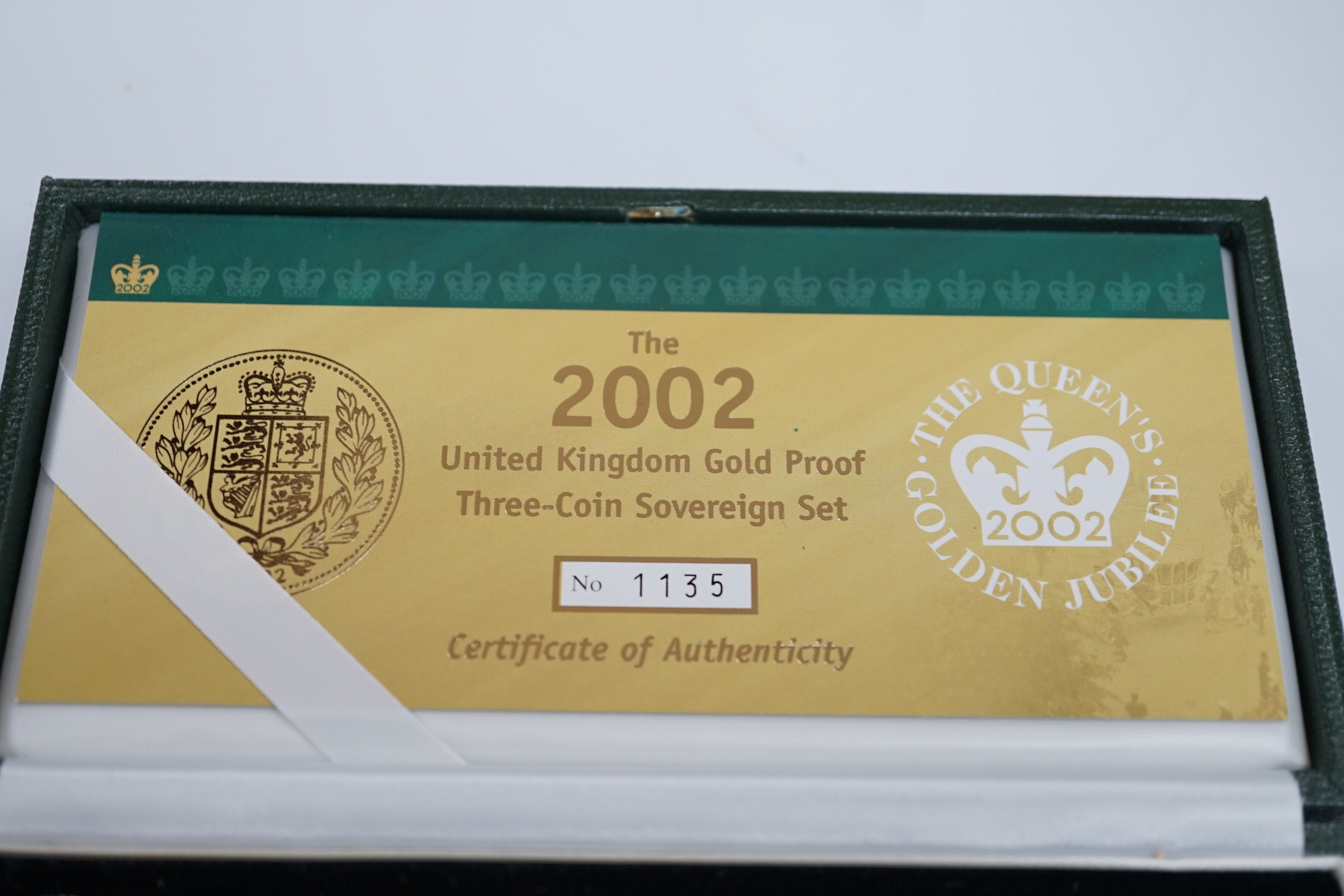 A cased 2002 United Kingdom gold proof sovereign three coin collection, with certificate. - Image 5 of 5