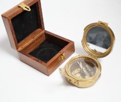 A gilt metal circular pocket barometer by Gallagher and Co., New Bond Street, London (lacks case)