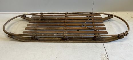 A large vintage wooden sled, length 220cm