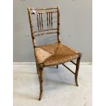 A Regency painted simulated bamboo side chair, original paint with caned seat