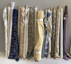 Eighteen various ends of rolls of fabrics, mostly cottons