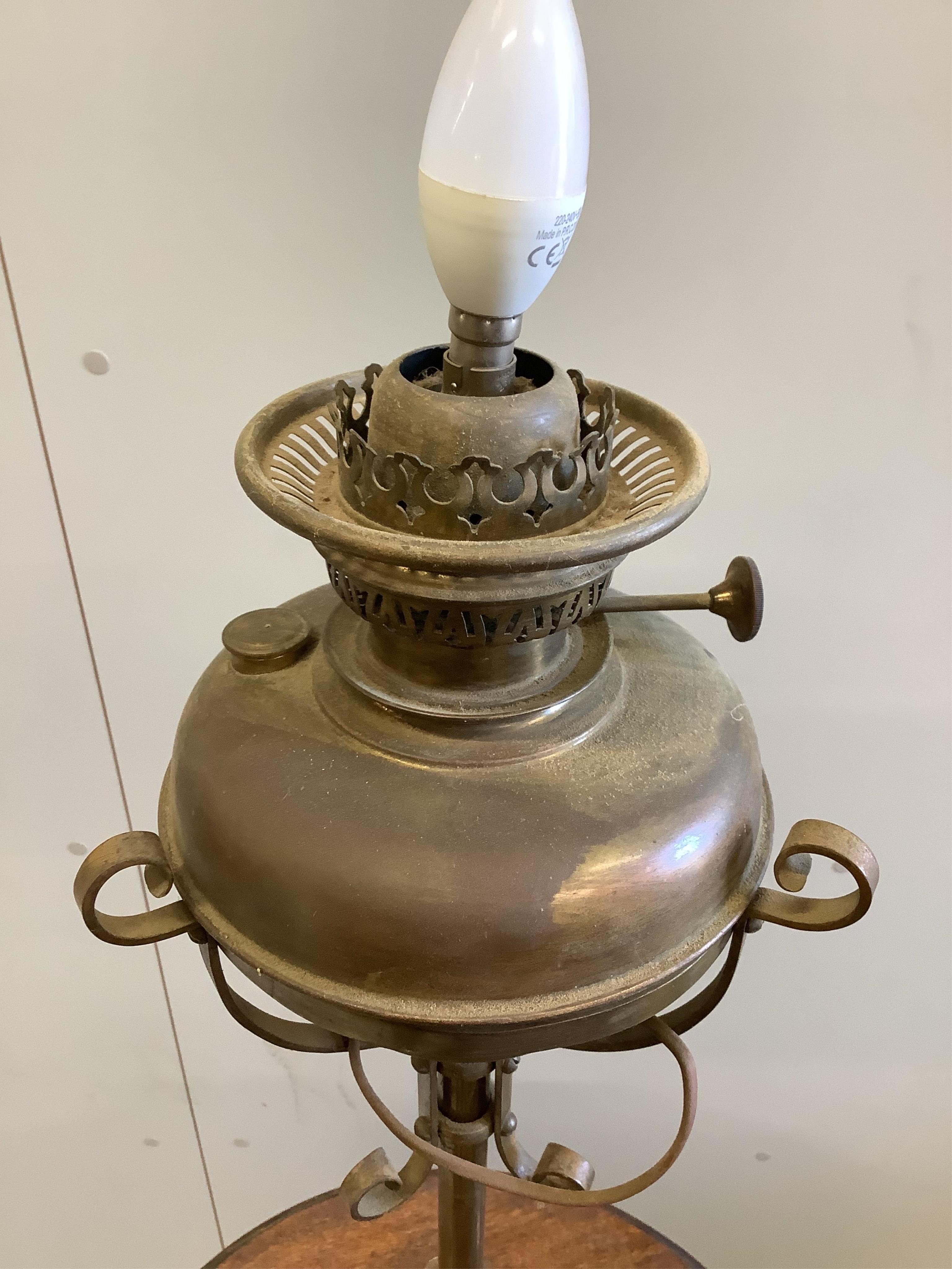 A late Victorian brass and oak telescopic oil lamp standard, converted to electricity, height 152cm - Image 2 of 2