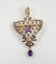 An Edwardian Art Nouveau 9ct, amethyst and seed pearl set drop pendant, 50mm, gross weight 5.2