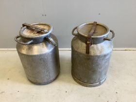 A pair of vintage galvanised milk churns, height 52cm