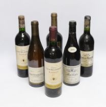 Six bottles of red wine - two bottles of Chateau Tour Bellegrave 2003, a bottle of Baron De Ley