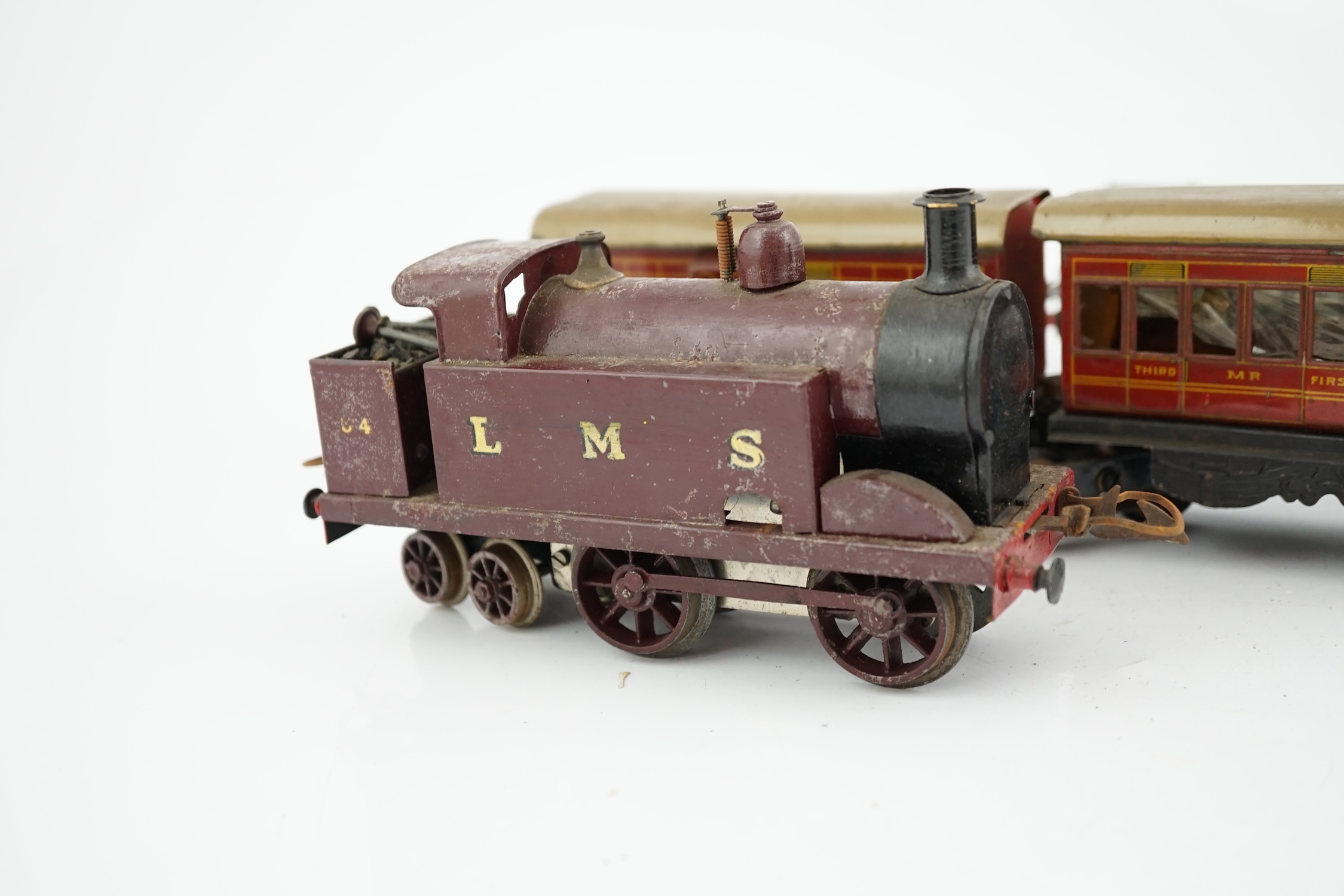 Ten 0 gauge tinplate railway items, most adapted from other parts and models, including three - Image 9 of 12