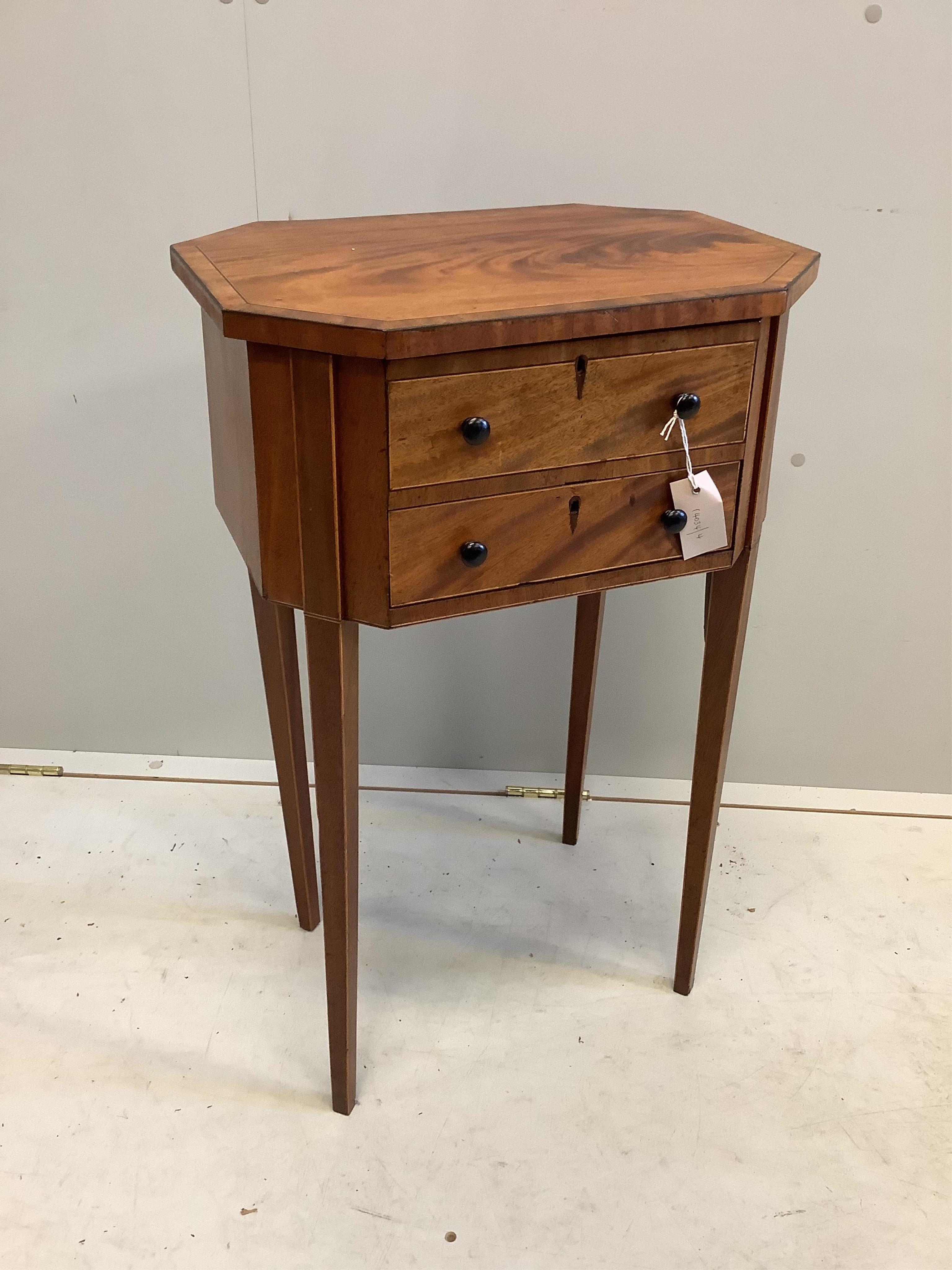 A George III banded mahogany octagonal work table, width 45cm, depth 33cm, height 73cm