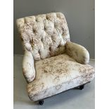 A reproduction Victorian style upholstered armchair, width 76cm, depth 80cm, height 86cm
