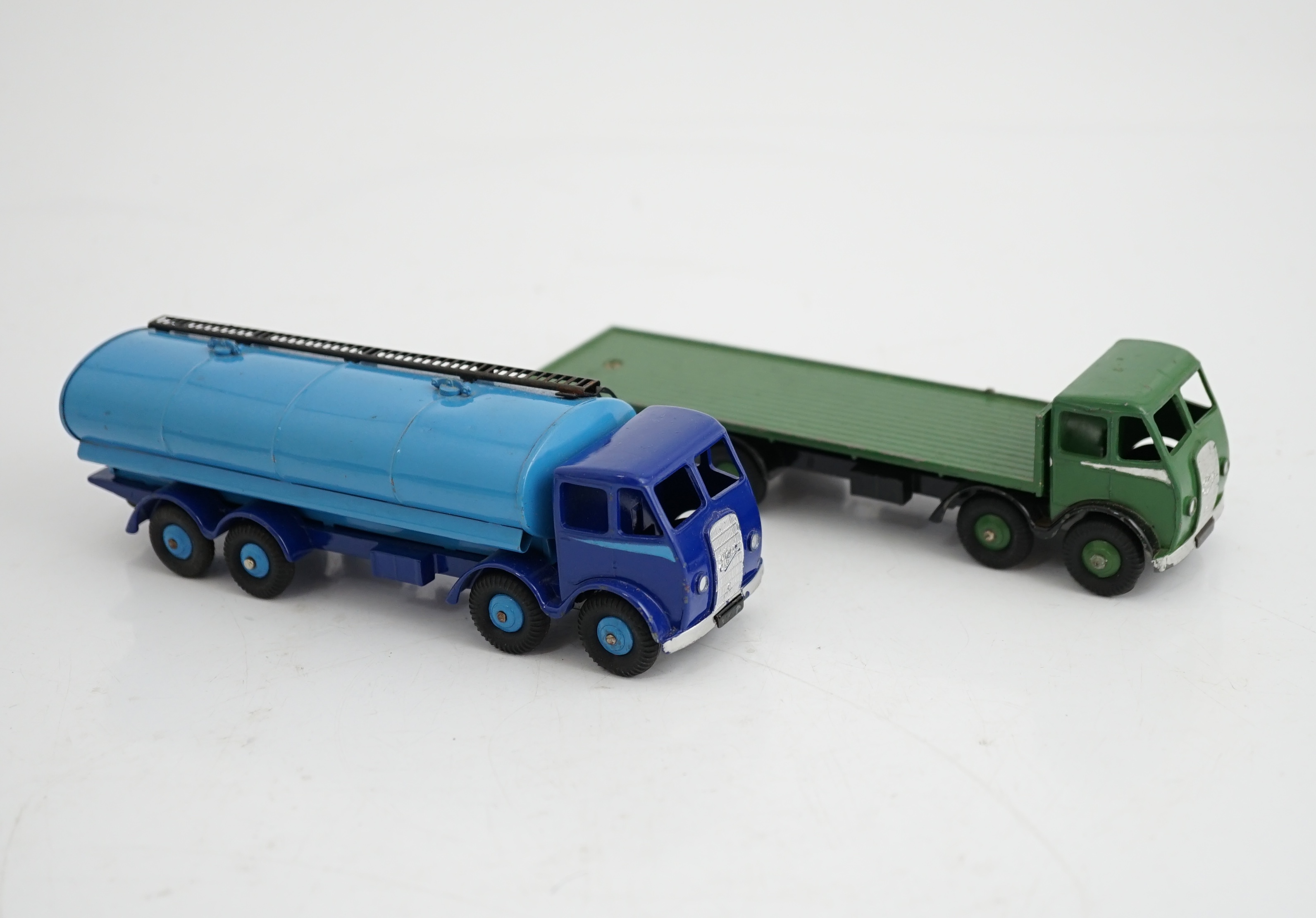 Two boxed Dinky Supertoys first type Fodens; a 14-ton tanker (504), with dark blue cab and