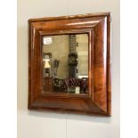 A walnut veneered cushion-framed wall mirror, in the William & Mary style, width 45cm, height 50cm
