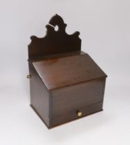 A late 18th century mahogany candle box, fitted small drawer and hinged lid, 36cm