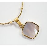 A yellow metal and mother of pearl inset pendant, 11mm on a 18kt fine link chain, 42cm, gross weight