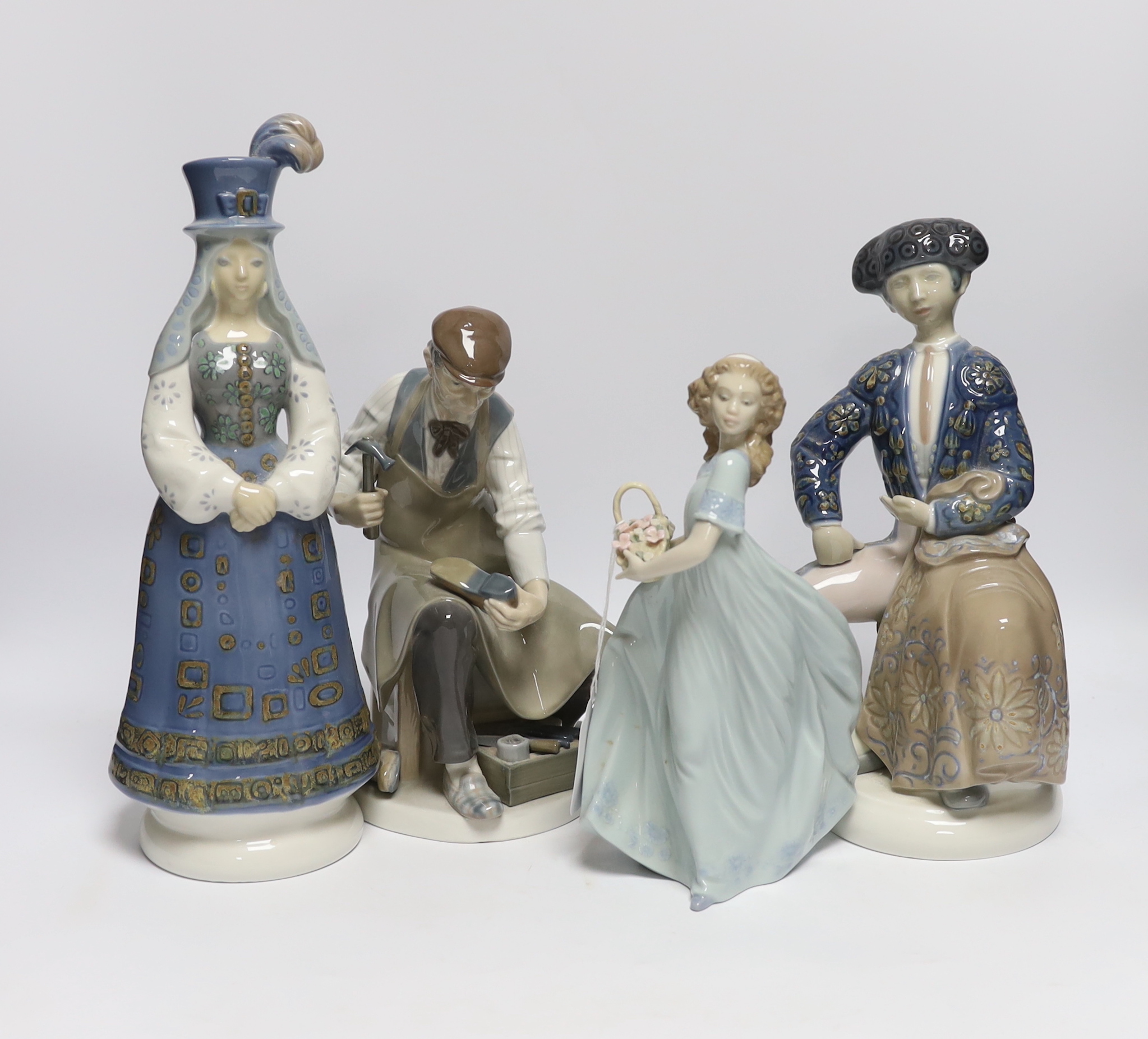 Four Lladro figures: a matador, two women and a cobbler, tallest 33cm