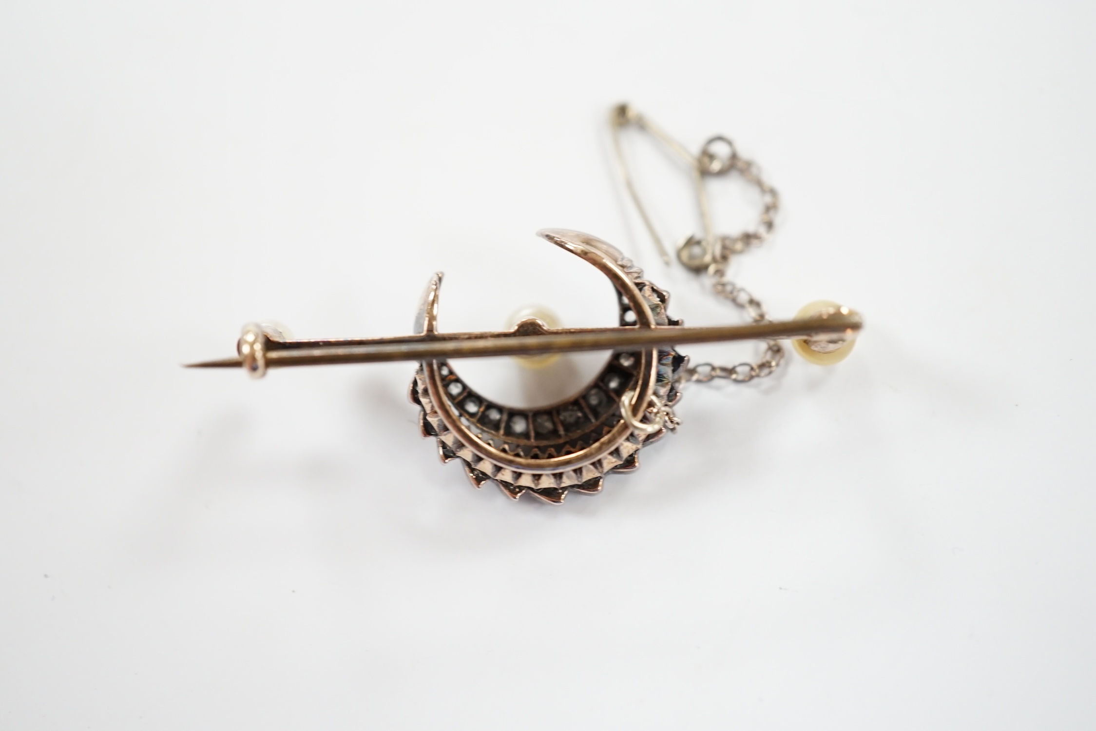 A Victorian yellow and white metal, diamond and pearl set crescent bar brooch, 44mm, gross weight - Image 3 of 3