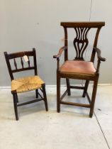 A late 18th / early 19th century child's mahogany correction / high chair, having scrolled arms,