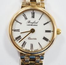 A lady's modern 9ct gold quartz bracelet wrist watch, retailed by Brufords, overall 17.7cm, gross