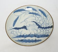 A Japanese Arita blue and white 'egret or heron' dish, 18th century, 28cm
