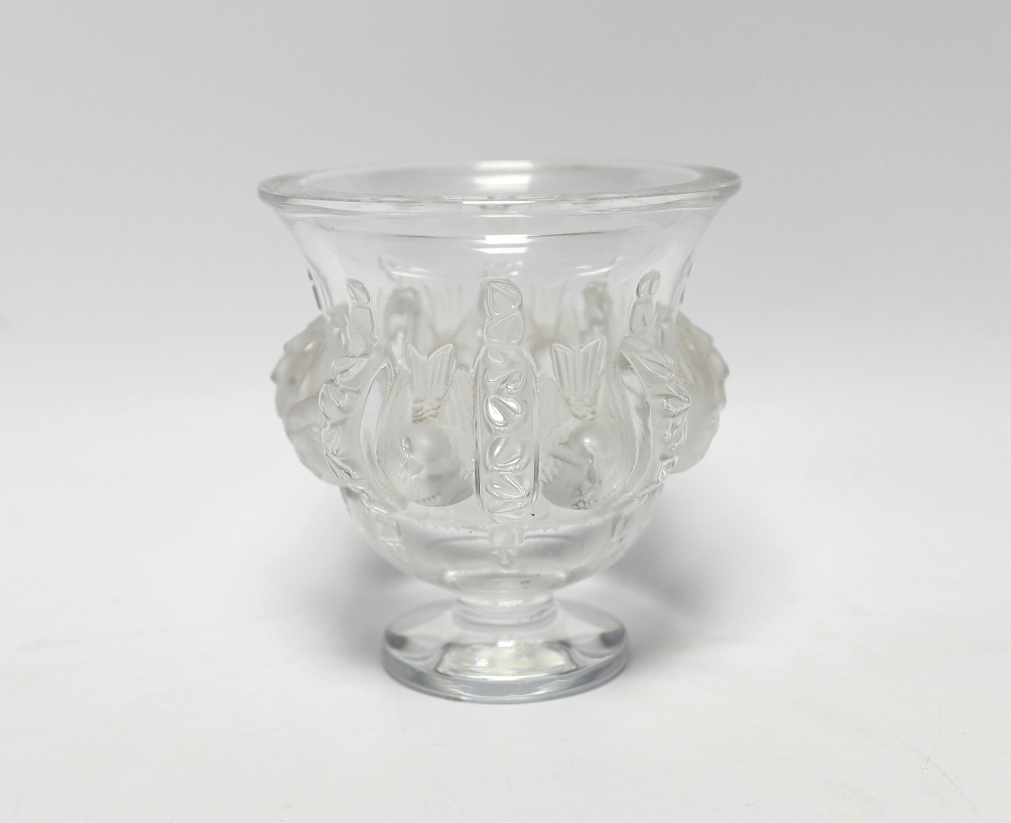 A later 20th century Lalique glass pedestal vase decorated in the Dampierre pattern, engraved