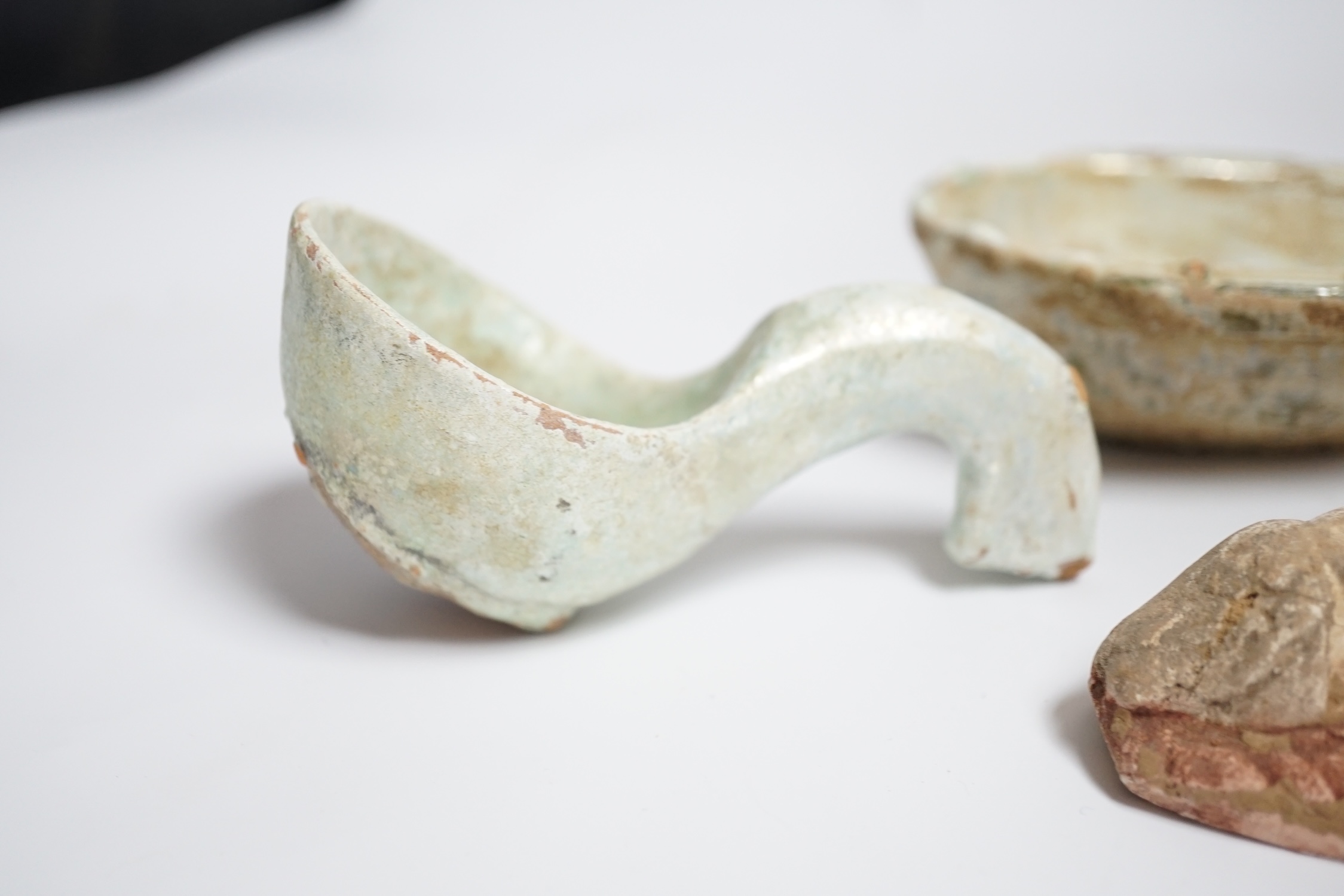 A Chinese glazed pottery ‘ear’ cup and similar spoon, Han dynasty, and a pottery figure, Song - Image 3 of 4