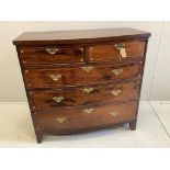 A late Georgian mahogany bowfront chest fitted two short and three long drawers, line and fan inlay,