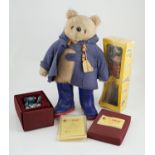 An early Paddington bear, blue jacket, missing hat, a Steiff Ltd. edition lilac bear in box, and a