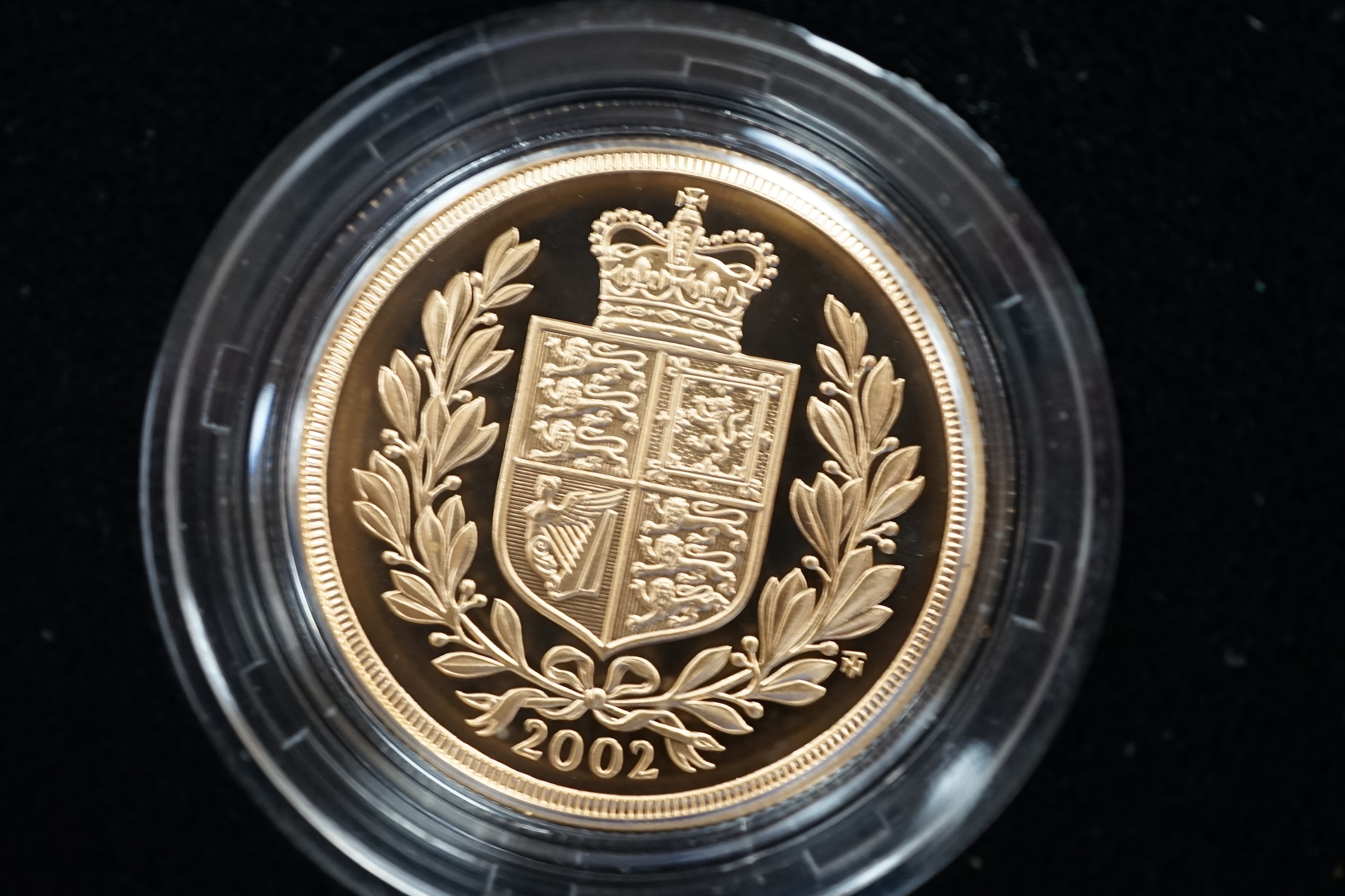 A cased 2002 United Kingdom gold proof sovereign three coin collection, with certificate. - Image 4 of 5