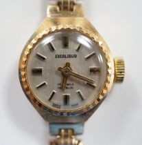 A lady's 9ct gold Excalibur manual wrist watch, on a 9ct gold bracelet, overall 17.5cm, gross weight