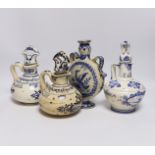 A Delft moonflask and three Delft jugs, largest 22cm