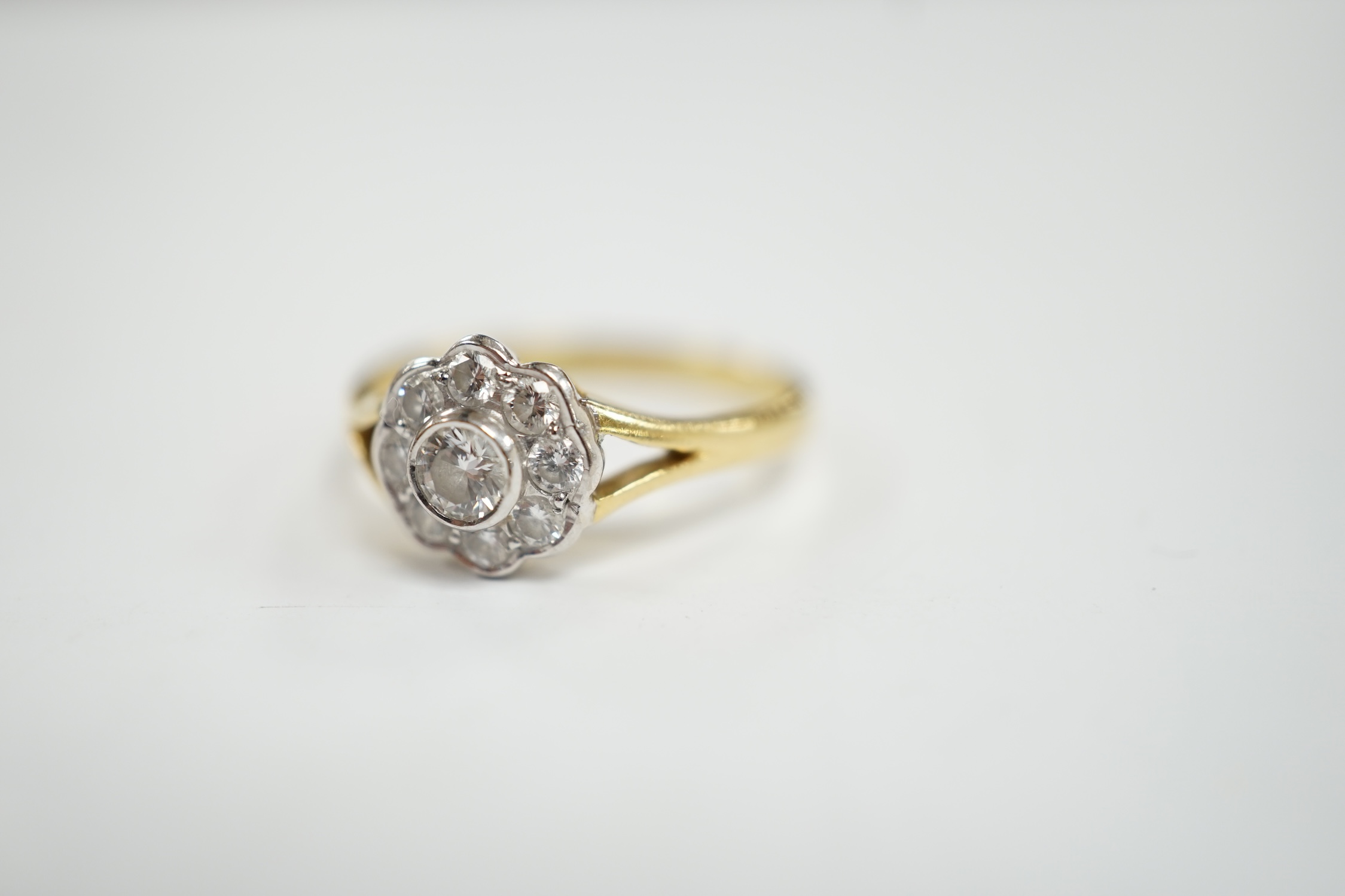 A modern 18ct gold and nine stone diamond set flower head cluster ring, size M, gross weight 3 - Image 2 of 3