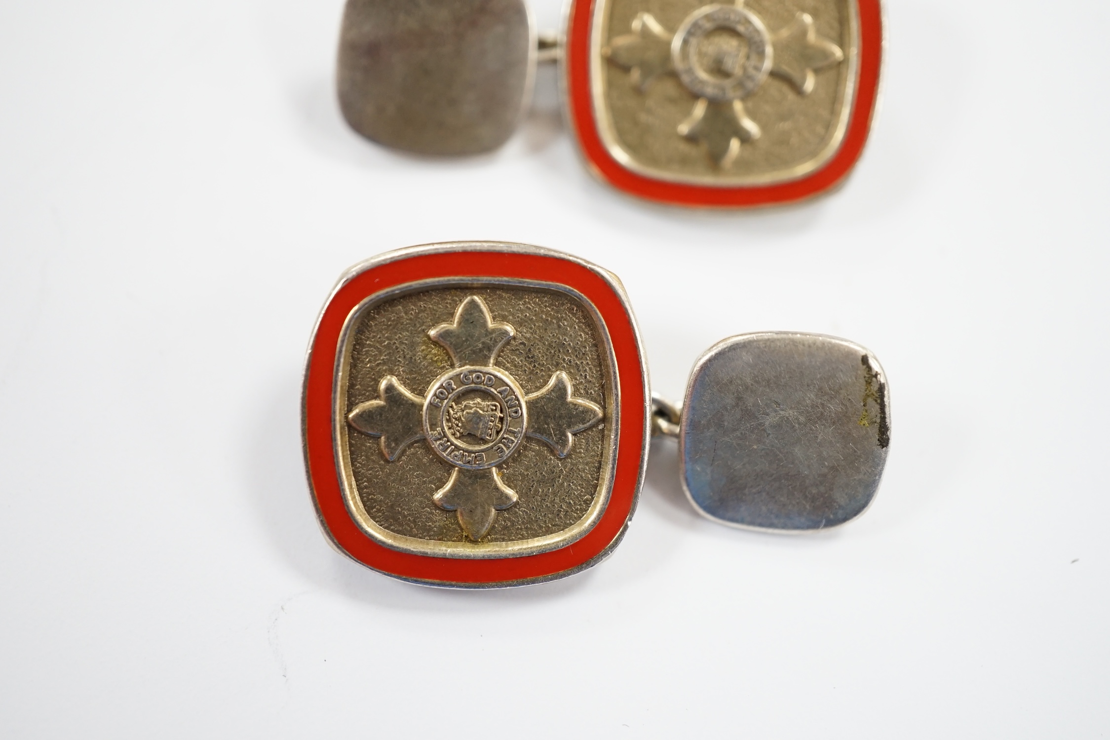 A modern pair of silver and red enamel cufflinks, embossed with the Order of The British Empire, - Image 4 of 6