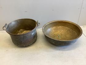 A Victorian circular brass pan together with a circular brass dairy pan, larger diameter 66cm