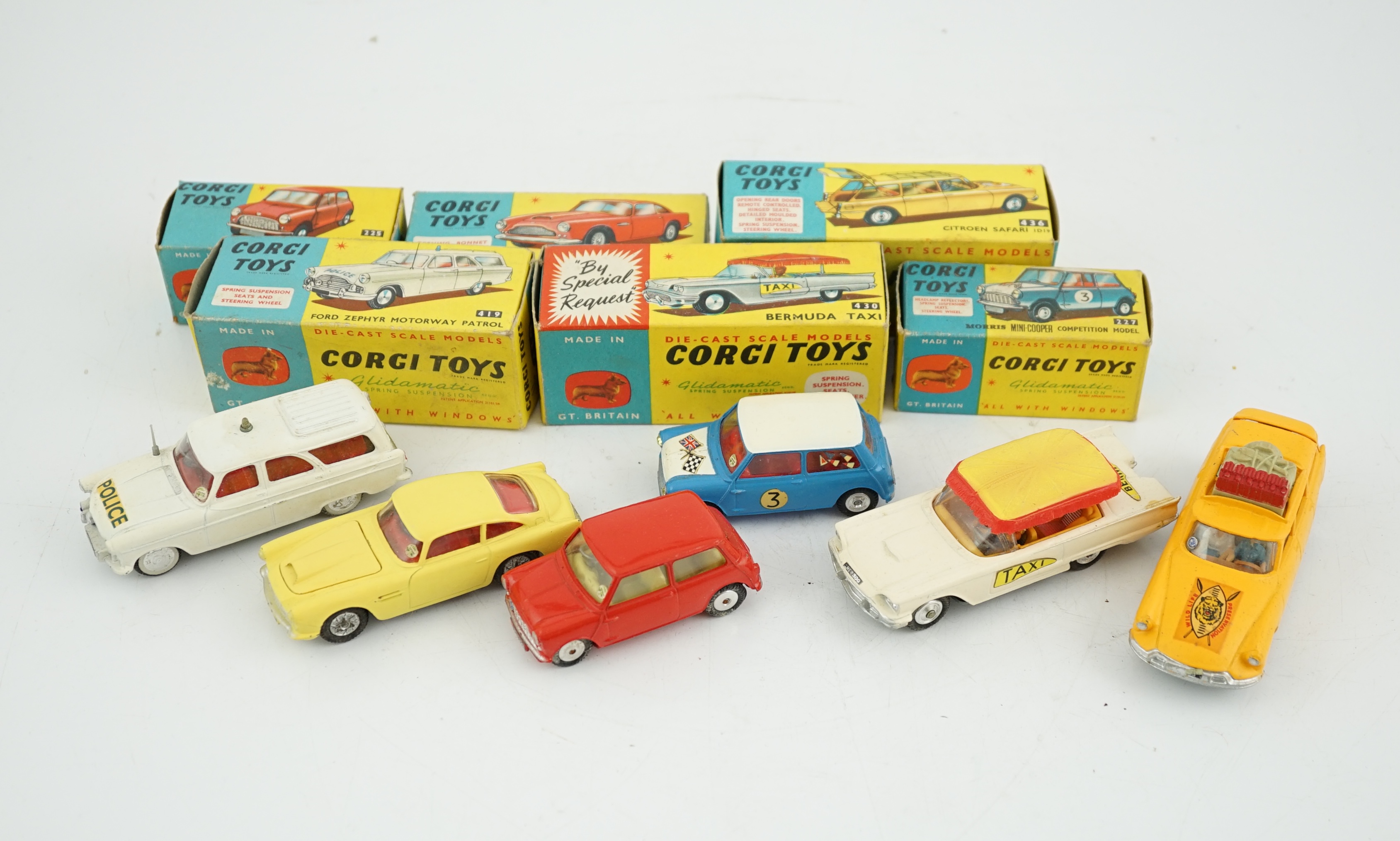 Six boxed Corgi Toys cars; Aston Martin DB4 in yellow (218), Austin seven in red (225), Morris - Image 5 of 8