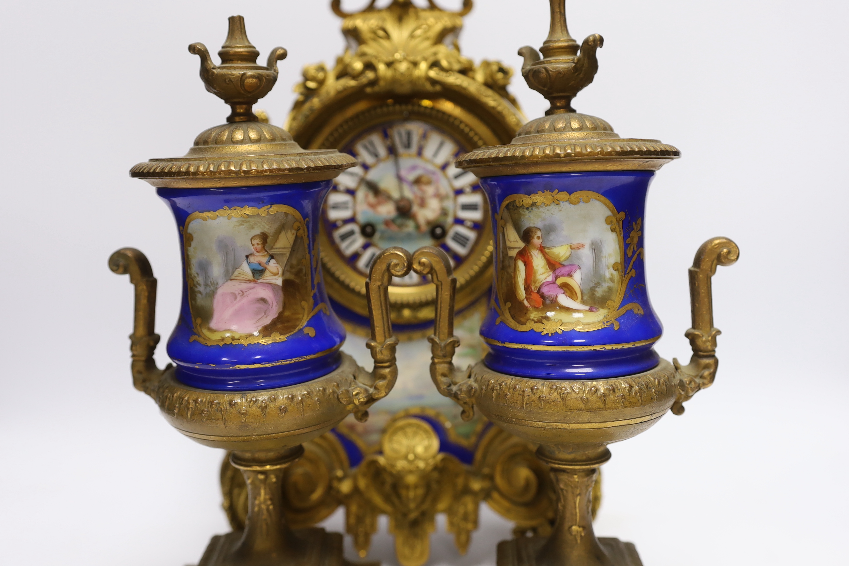 A Sevres style ormolu clock, Miller & Sons with two similar gilt spelter urns, pendulum no key, - Image 2 of 6