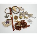 Two wrist watches, assorted badges and costume jewellery including paste set.