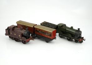 Ten 0 gauge tinplate railway items, most adapted from other parts and models, including three