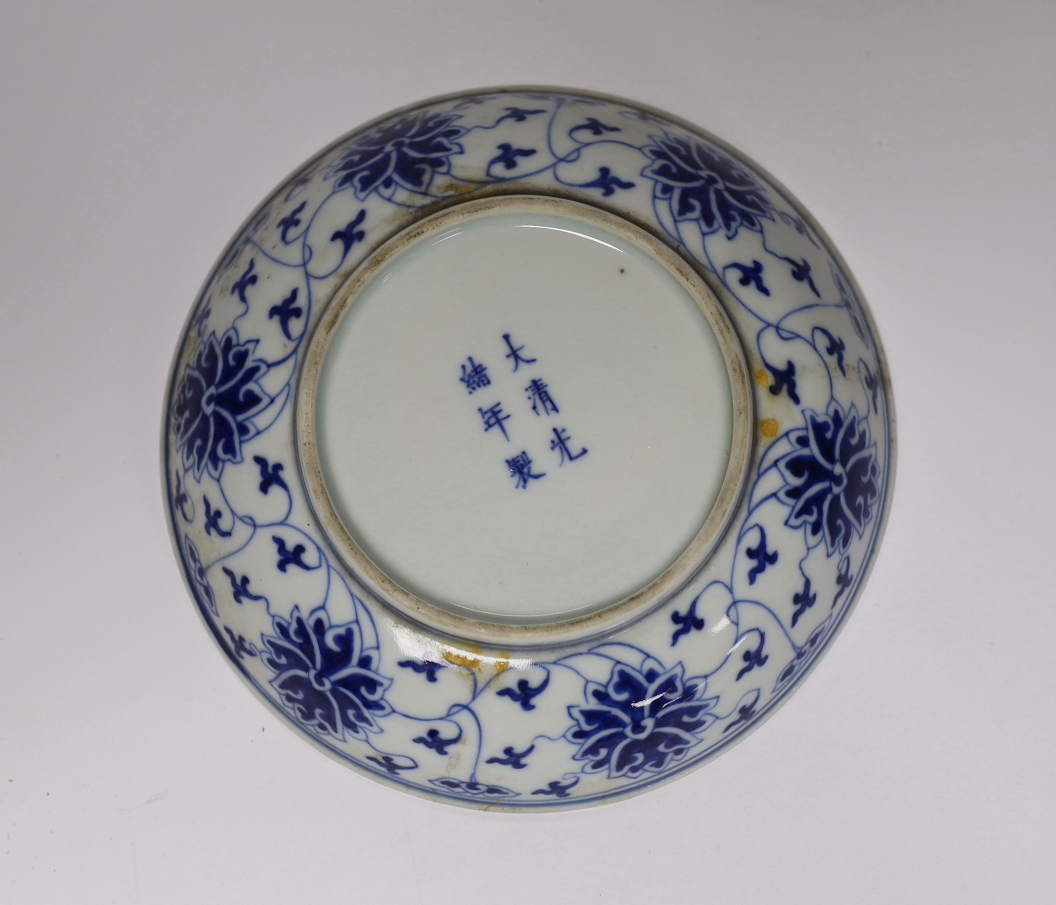 A Chinese blue and white lotus saucer dish, Guangxu mark and of the period (1875-1908), 15.5cm - Image 2 of 2