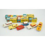 Six boxed Corgi Toys cars; Aston Martin DB4 in yellow (218), Austin seven in red (225), Morris