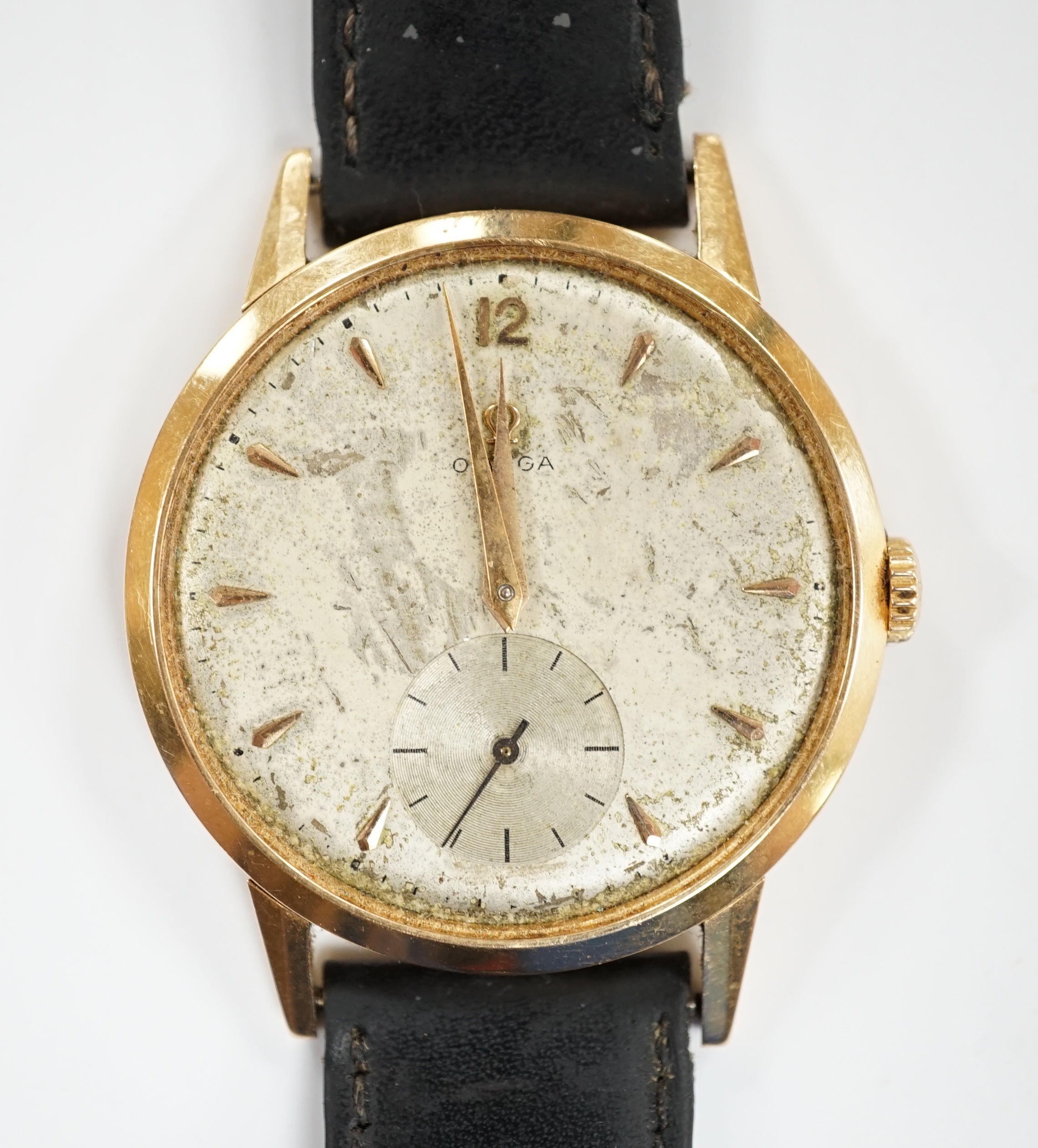 A gentleman's 18k Omega manual wind wrist watch, on a later associated leather strap, case