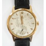 A gentleman's 18k Omega manual wind wrist watch, on a later associated leather strap, case