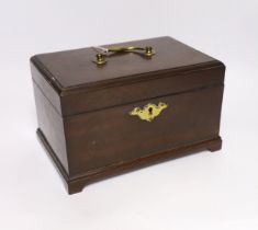 A small George III mahogany tea caddy with divisional interior, 23cm