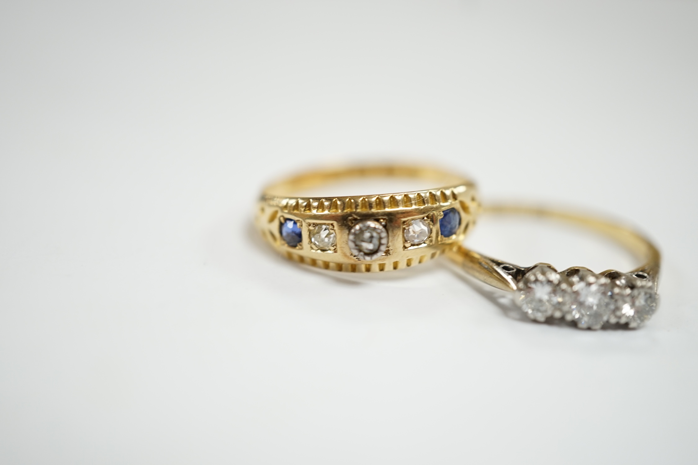 An 18ct, plat and three stone diamond set ring, size K and a late Victorian 18ct gold three stone - Image 3 of 4