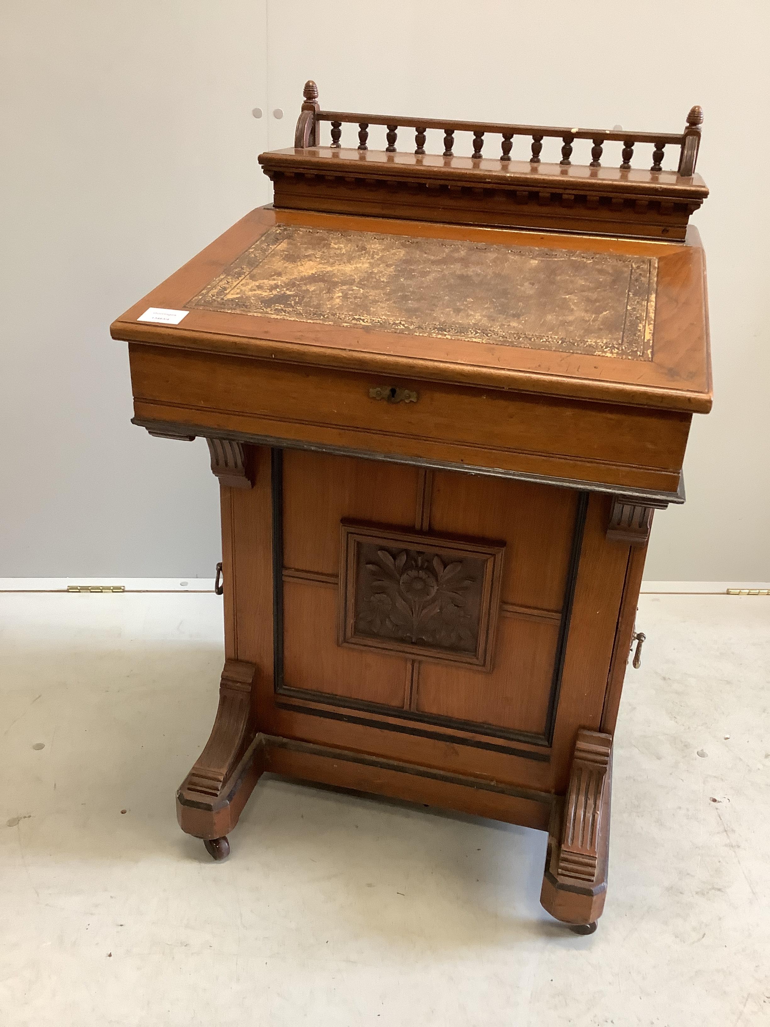 A late Victorian Aesthetic movement mahogany davenport by Jas. Shoolbred & Co., width 56cm, depth