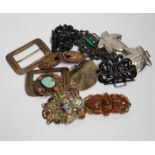 A collection of 20th century and later buckles including jet, Art Deco paste, Japanese Satsuma and